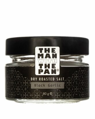 Man with the pan black garlic